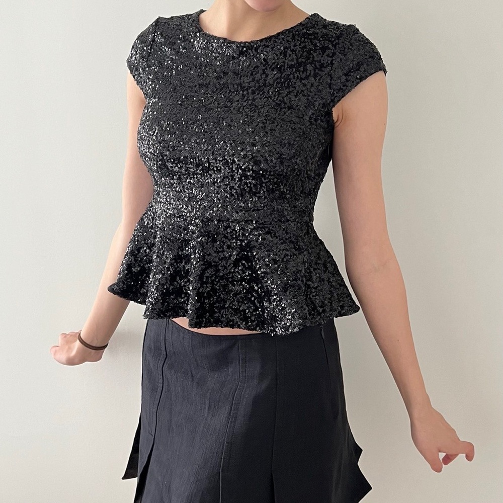 Gorgeous sequin peplum Bebe top